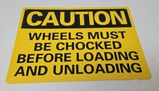 Caution Wheels Must Be Chocked Before Loading Unloading Plastic Sign 14" x 10"