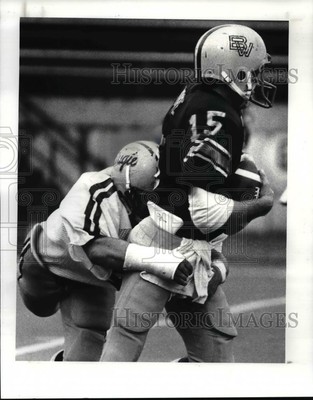 1982 Press Photo Brian Moore of Baldwin Wallace tackled by Augusta player