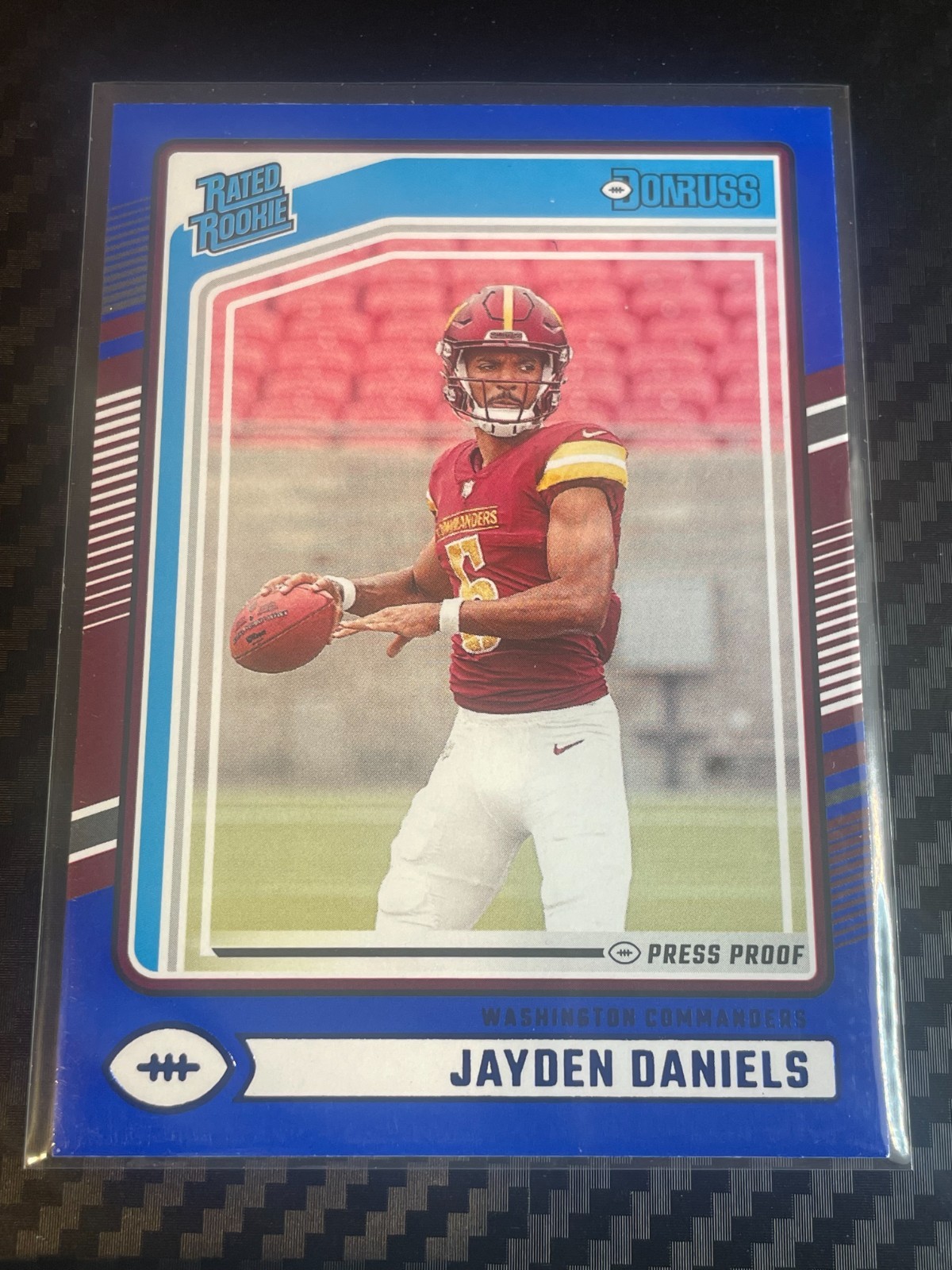 2024 Panini Donruss Jayden Daniels Blue Press Proof RC #389 Commanders