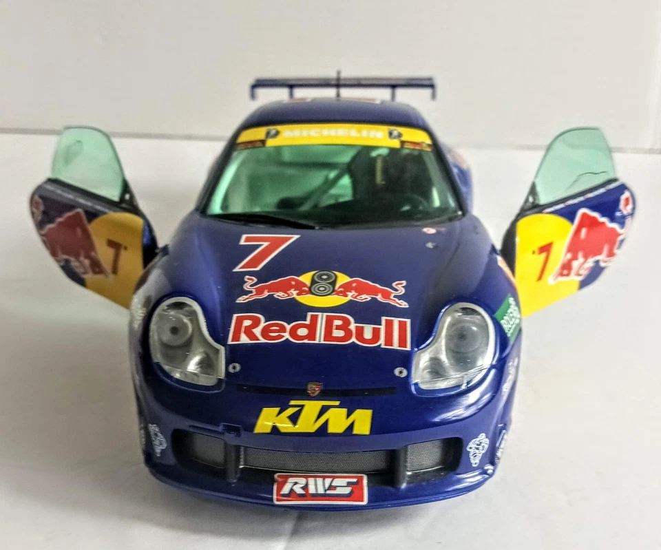 Coche de carreras 1:18 Porsche 911 GT3R Red Bull Sunstar #7 Foto 3 de 4