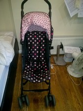 COSSATO PUSHCHAIR WITH LOTS OF EXTRAS. FOLDABLE AND LIGHTWEAR. EASY TO OPERATE.