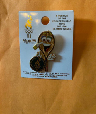 ATLANTA OLYMPICS PIN IZZY MASCOT MORPH TENNIS RACKET BALL NEW RARE