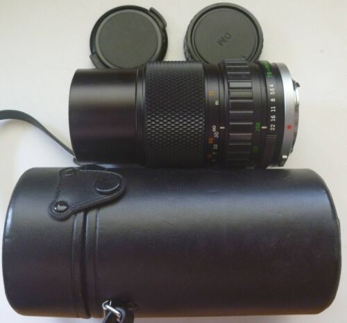 Olympus OM-SYSTEM ZUIKO AUTO-ZOOM 75-150mm 1:4. Comes with case and caps. NICE.
