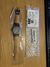 Watch   GENEVA. QUARTZ. Brown  faux leather strap. Brand new and good condition