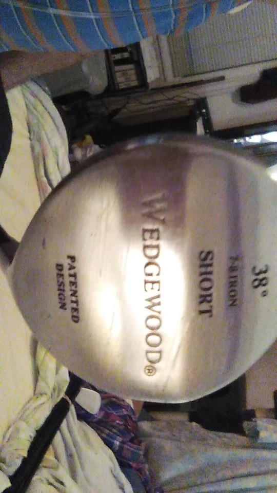 A full set of Wedgewood irons and woods, including the original