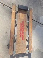 Vintage wooden mechanics creeper with metal wheels 