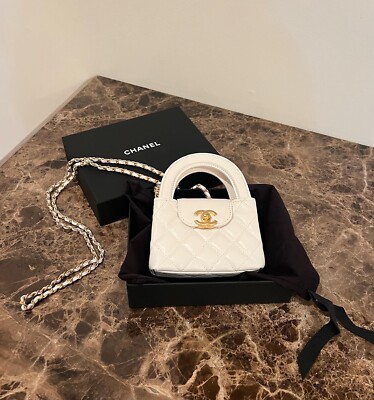 CHANEL ホワイト ミニバッグ New 23K CHANEL KELLY White Gold Top Handle Nano Mini SLG Shopping
