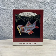 Hallmark Keepsake Christmas Ornament Holiday Fliers Santa Tin Airplane 1993