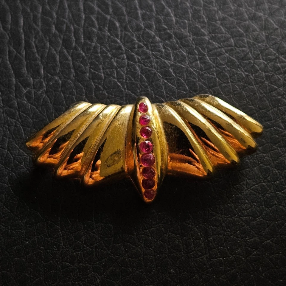 Pendentif aigle stylisé éventail doré bande de cristaux rouges bijou - Photo 2/4