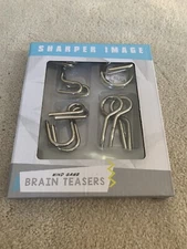 Sharper Image 4 pc Unique Brain Teasers Puzzles Mind Game New Sealed