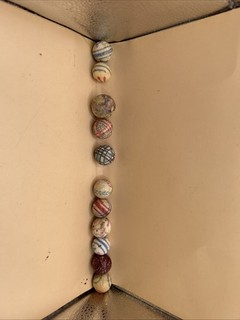 Old Lot of 11 German China Marbles Unglazed Helix Lined