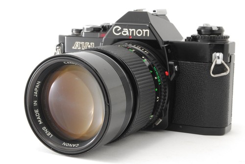 Lot Appareil Photo Canon AV-1 35mm + Objectifs FD 50mm Et Zoom Cosina + Flash