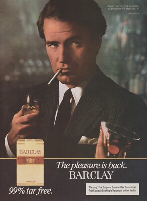 1983 Barclay Cigarettes - Businessman Lights Up Zippo Lighter - Print Ad Photo