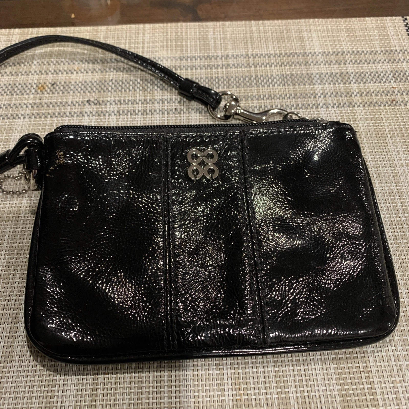 Borsa pochette Coach nera da polso logo argento piccola zip borsetta designer elegante