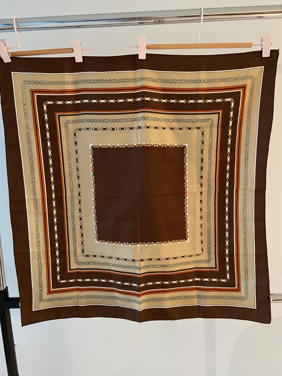 Scarf with a geometric (square) design pattern in… - image 1