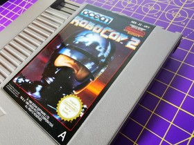 Cartucho de sistema de entretenimiento Robocop 2 NES Nintendo + funda antipolvo