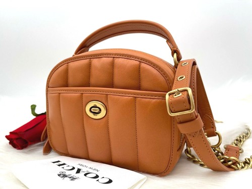 coach ivory pillow tabby