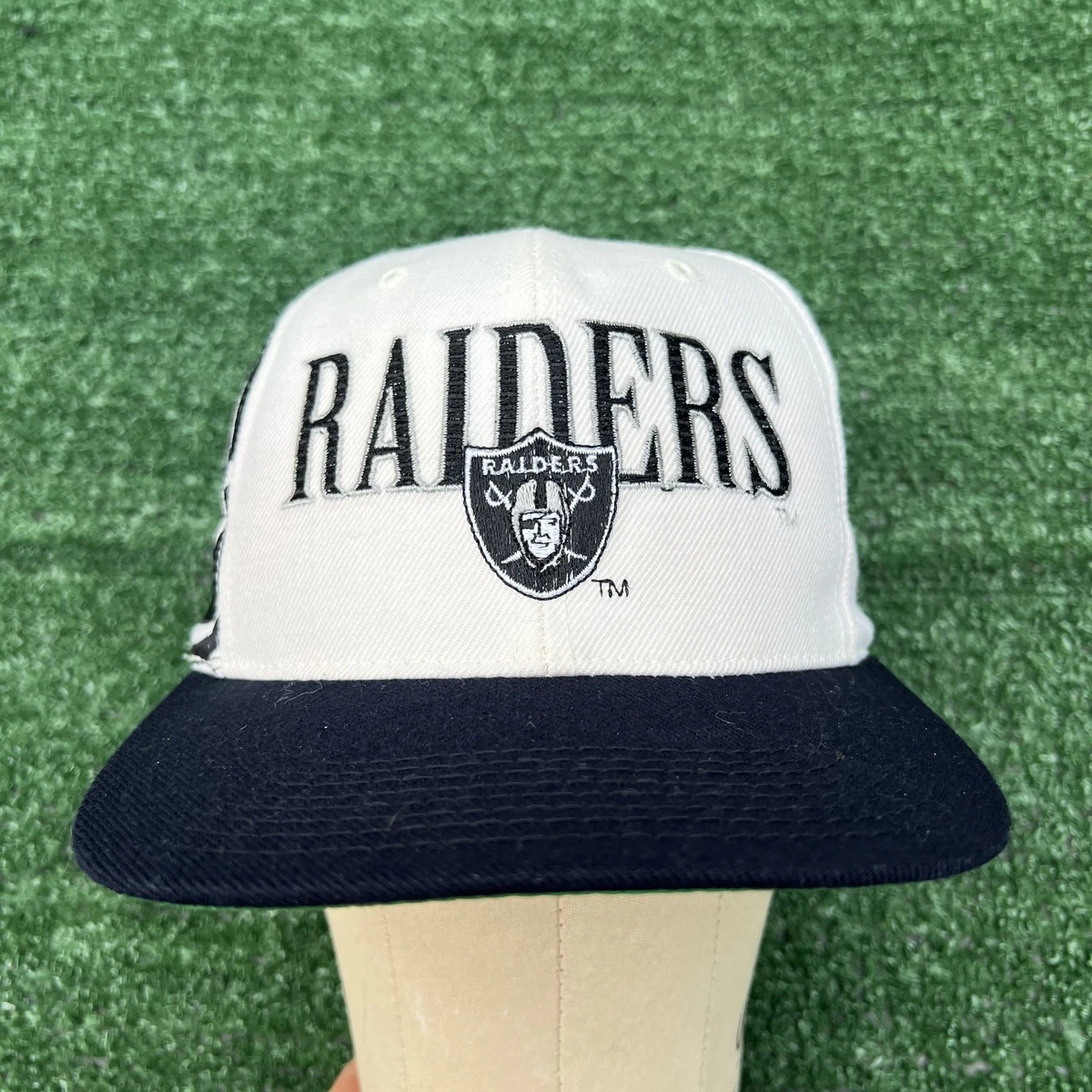 Preços baixos em Los Angeles Raiders snapback Futebol Americano