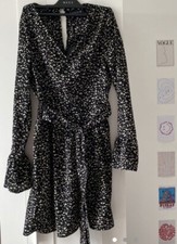 black dalmatian print binding detail tie waist tea dress from prettylittlething