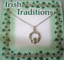 Claddagh necklace on 18" silvertone chain, made in USA, carded