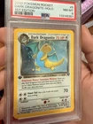 2000 Pokémon *Swirl* Team Rocket 1st Edition Dark Dragonite Holo #5 PSA 8 NM-MT