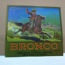 Redlands Foothill Groves Bronco Brand fruit crate label with cowboy Redlands, CA