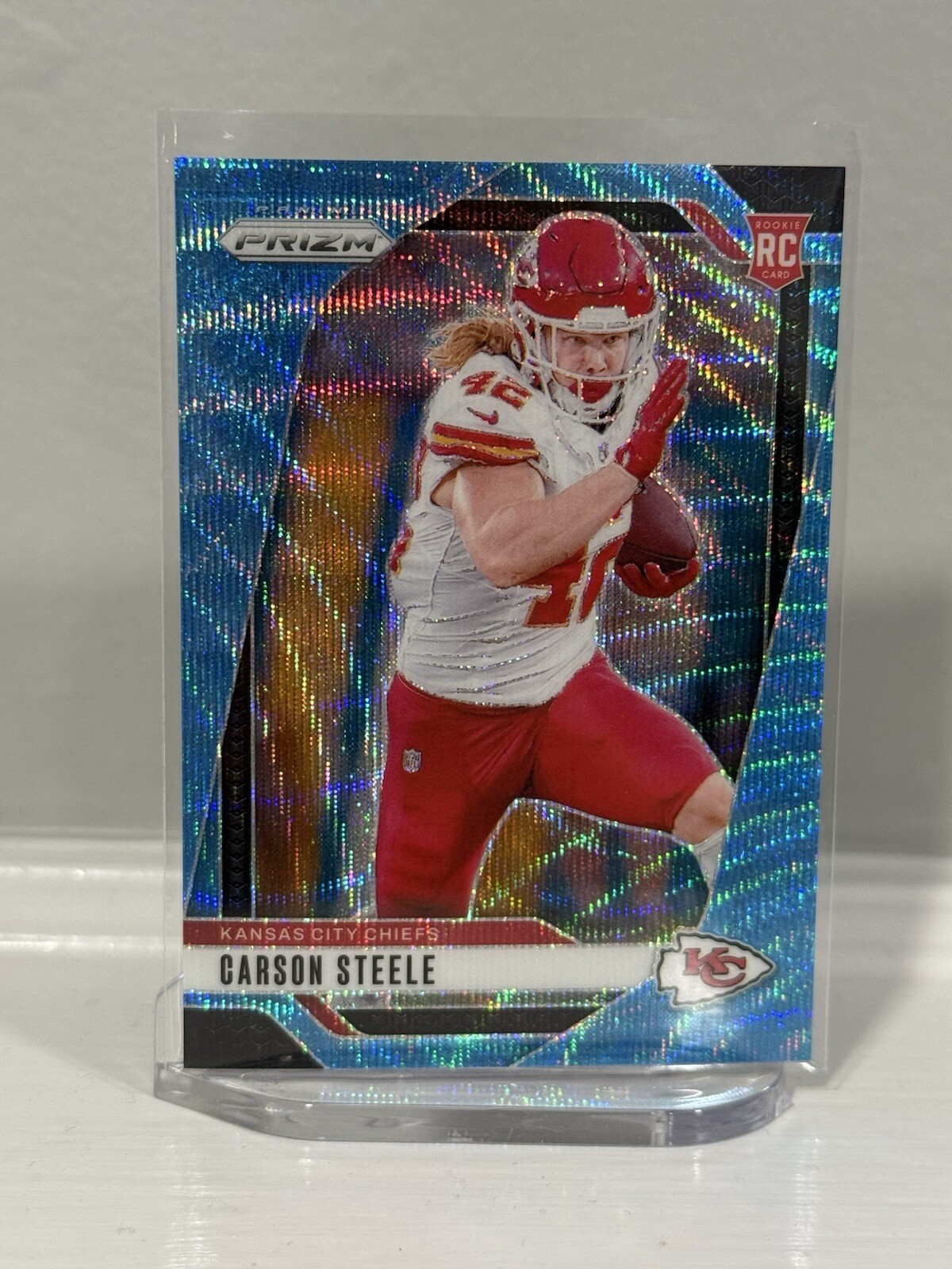 Carson Steele 2024 Panini Prizm Blue Wave Prizm /230 #377 Rookie RC Chiefs