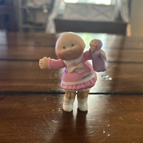 Vintage Cabbage Patch Doll Figurine Girl In Pink Dress Holding A Doll