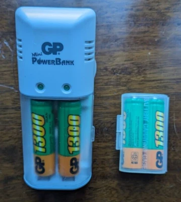 GP Mini PowerBank AA and AAA battery charger with 4 AA 1300mAh batteries - Image 1 of 4