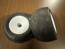 Proline Holeshot RC Stadium Truck Tires on White Jconcepts 12mm Mono Wheels