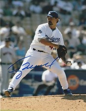 TERRY MULHOLLAND  LOS ANGELES DODGERS  ACTION SIGNED 8X10