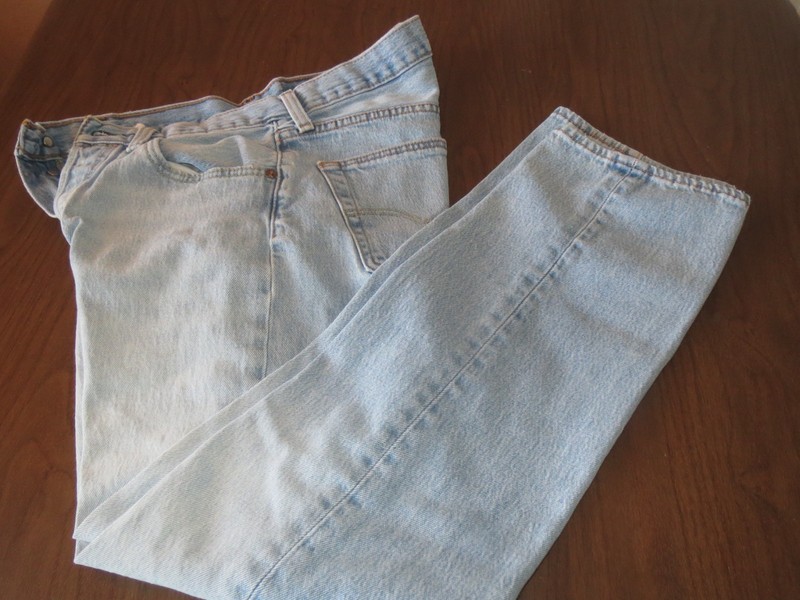 LEVIS- Men's 31-30 Good condition- faded look- light blue-button front