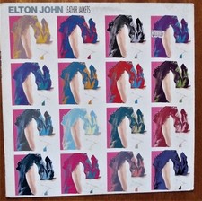 ELTON JOHN / LEATHER JACKETS 1986 THE ROCKET RECORD COMPANY