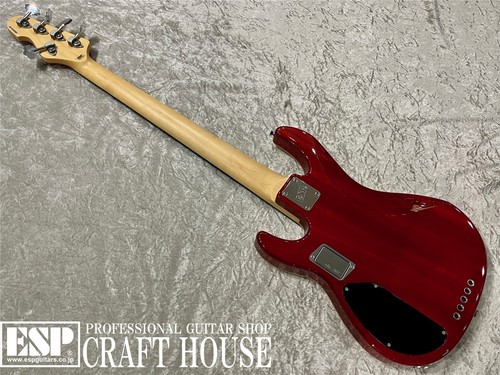 Red ESP Order Made AP-CTM 5ST bass guitar with gold hardware, black pickguard, and ESP logo on silver hardware.