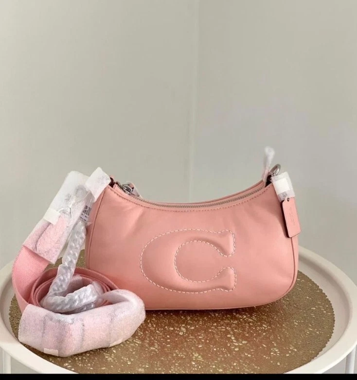 Light pink coach crossbody clearance