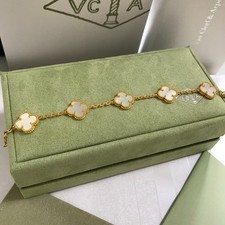 Auth 18K Gold Bracelet with 5 Motifs