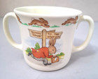 ROYAL DOULTON BUNNYKINS TWO HANDLED MUG. BUNNY TOWN, TO THE STATION. BONE CHINA