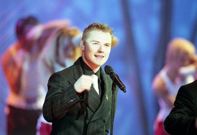 Boyzone - Ronan Keating performs at The 19th BRIT Awards 1999 with- Old Photo