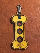 Dog Bone Joint Protector Holder. Nice item. Handy Item For Your Pool Cue Case