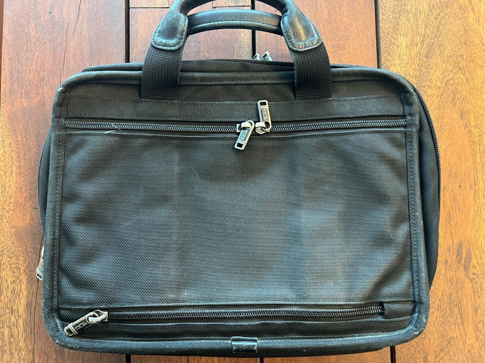 Tumi 26121D4  Laptop Brief Briefcase Expandable