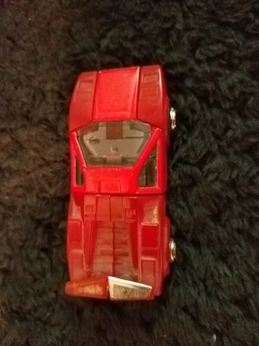 1983 Bandai GoBots Spoiler Renegade, Transforms from a robot to a Lamborghini