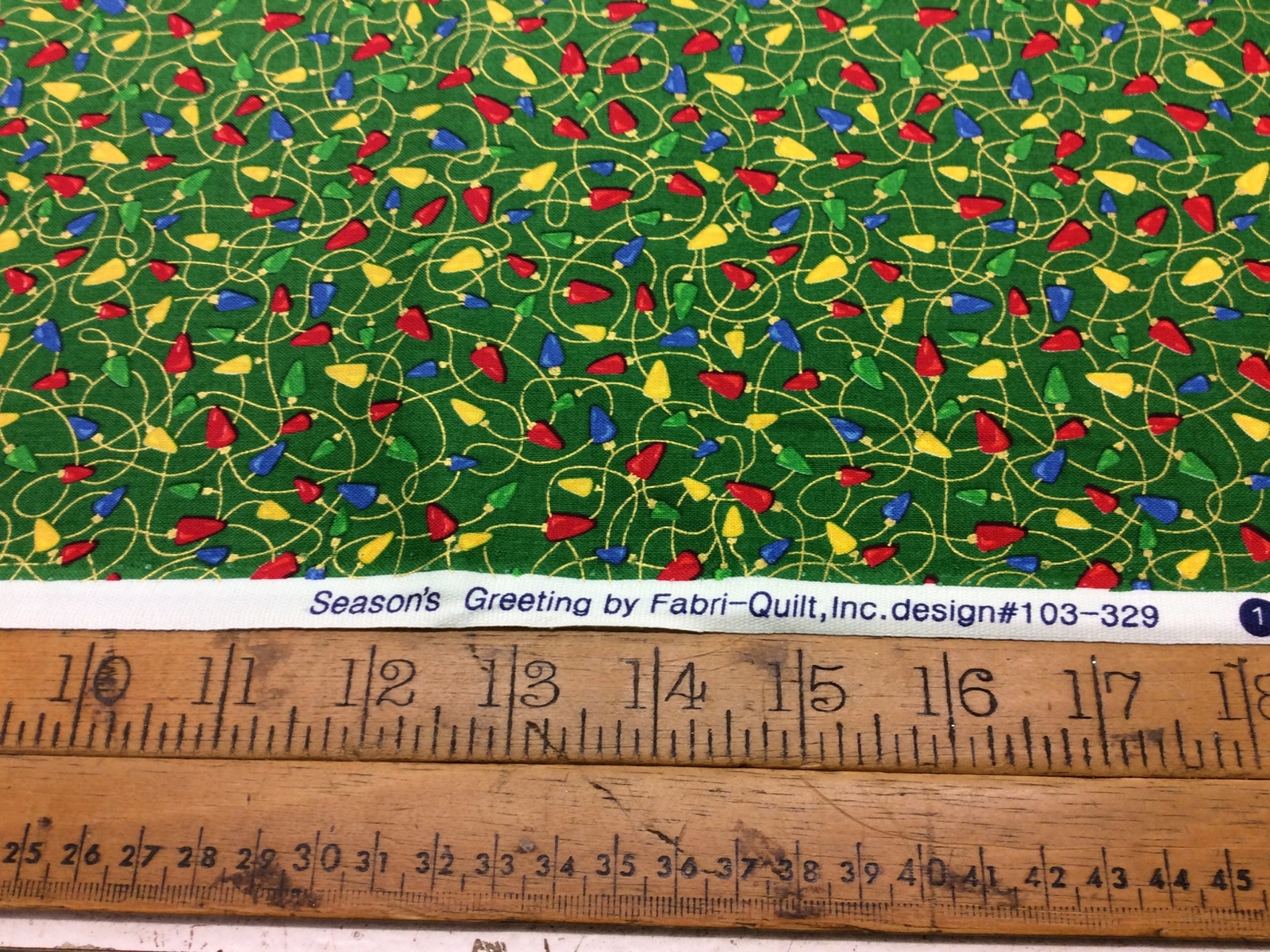 Fabri Quilt 103329 Seasons Greetings Christmas Lights On Green 100