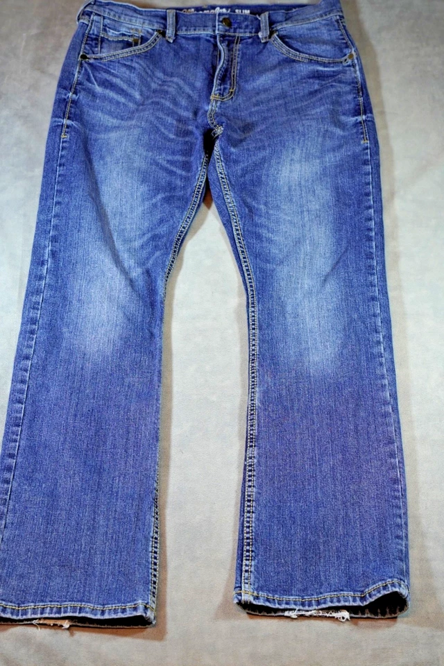 Pantalones de mezclilla retro Wrangler para hombre 33x34 se adapta a 34x33 azul bota ajustada bigote occidental Foto 3 de 4