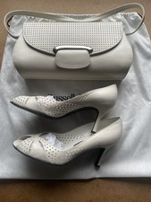 RUSSEL & BROMLEY STUART WEITZMAN Cream/ White Leather Court Shoes and  handbag.