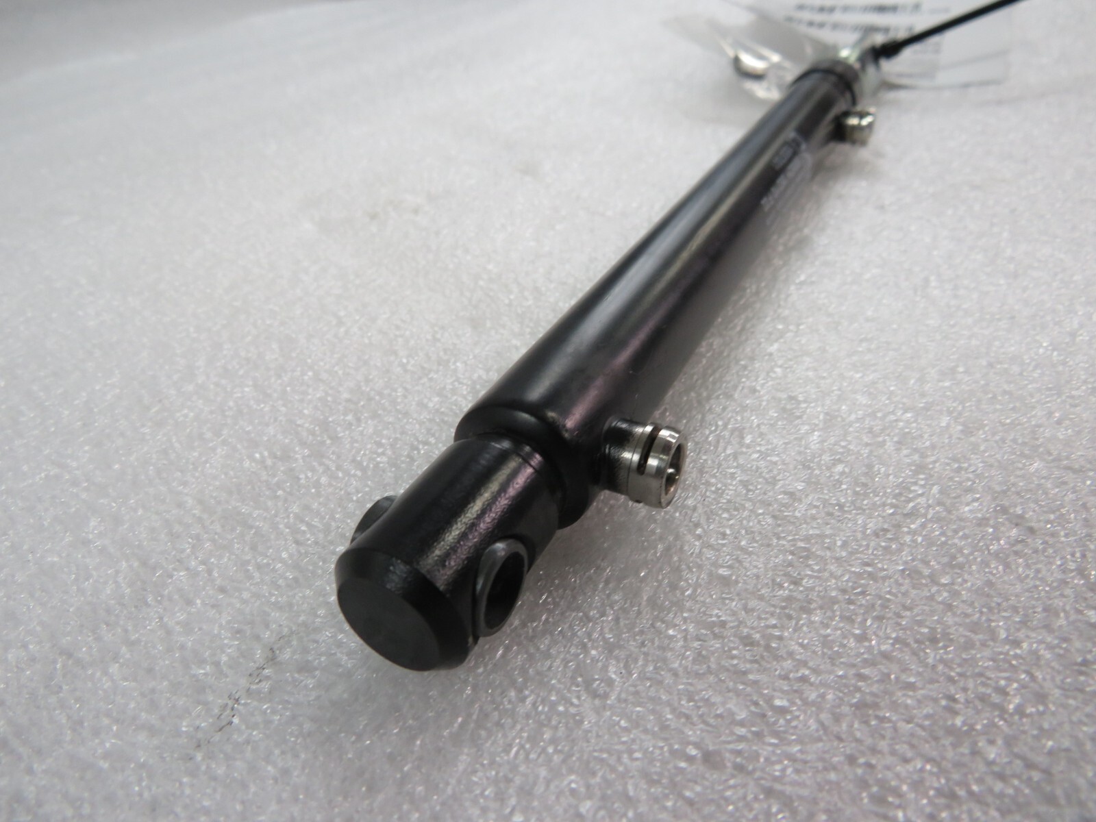 Ferrari California T, LH, Front Convertible Top Lift Cylinder, Used 81860200