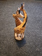 Hand Carved Freestanding wooden giraffes on a wooden plinth Wildlife