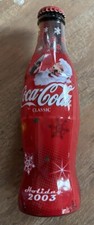 Coca-Cola 8 oz Commemorative Full Bottle Holiday 2003 Santa