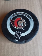 Ottawa Senators  Game Used Hockey Puck  Ref Paul Devorski