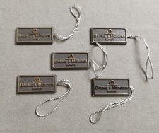 Baume & Mercier Vintage lot no. 5 plastic rectangular grey tag for any models nos