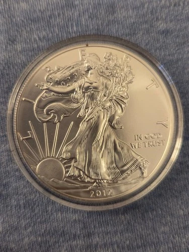 2012 WALKING LIBERTY AMERICAN EAGLE,  1 oz .999%  FINE SILVER DOLLAR COIN.